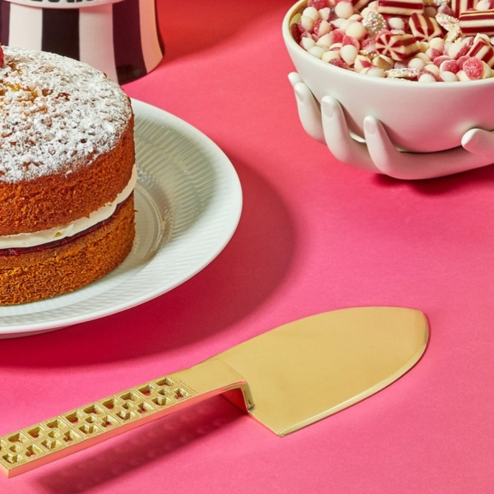 Jonathan Adler Nixon brass cake knife
